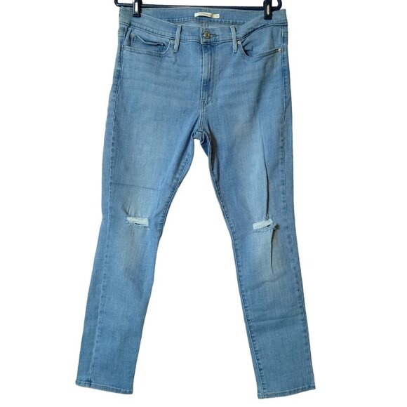 Levi’s Women's Size 33 Slimming Skinny Distressed Light Blue Mid-Rise Jeans - Picture 1 of 6